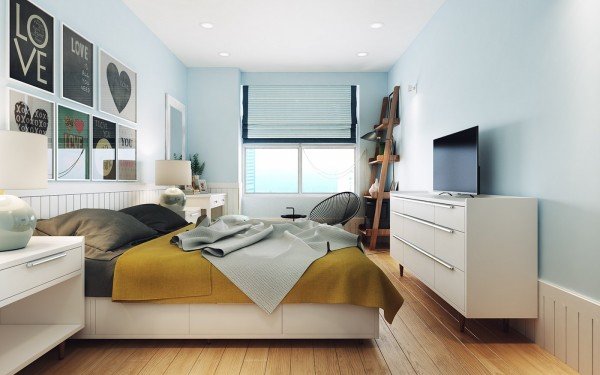 Dormitorio de estilo escandinavo con ropa de cama colocada